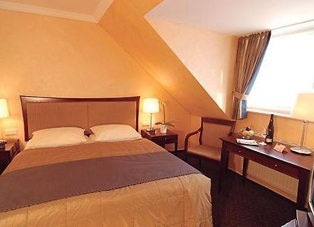 Hotel Ambiente Trevír Pokoj fotografie