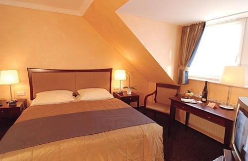 Hotel Ambiente Trevír Pokoj fotografie